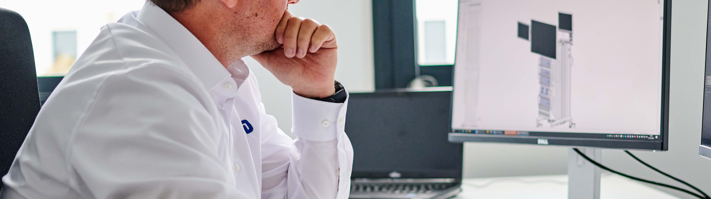 Employee sitting infront of a computer